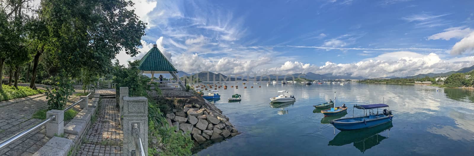 Panorama beautiful photography mountain, cloudscape, boat on lak by cougarsan