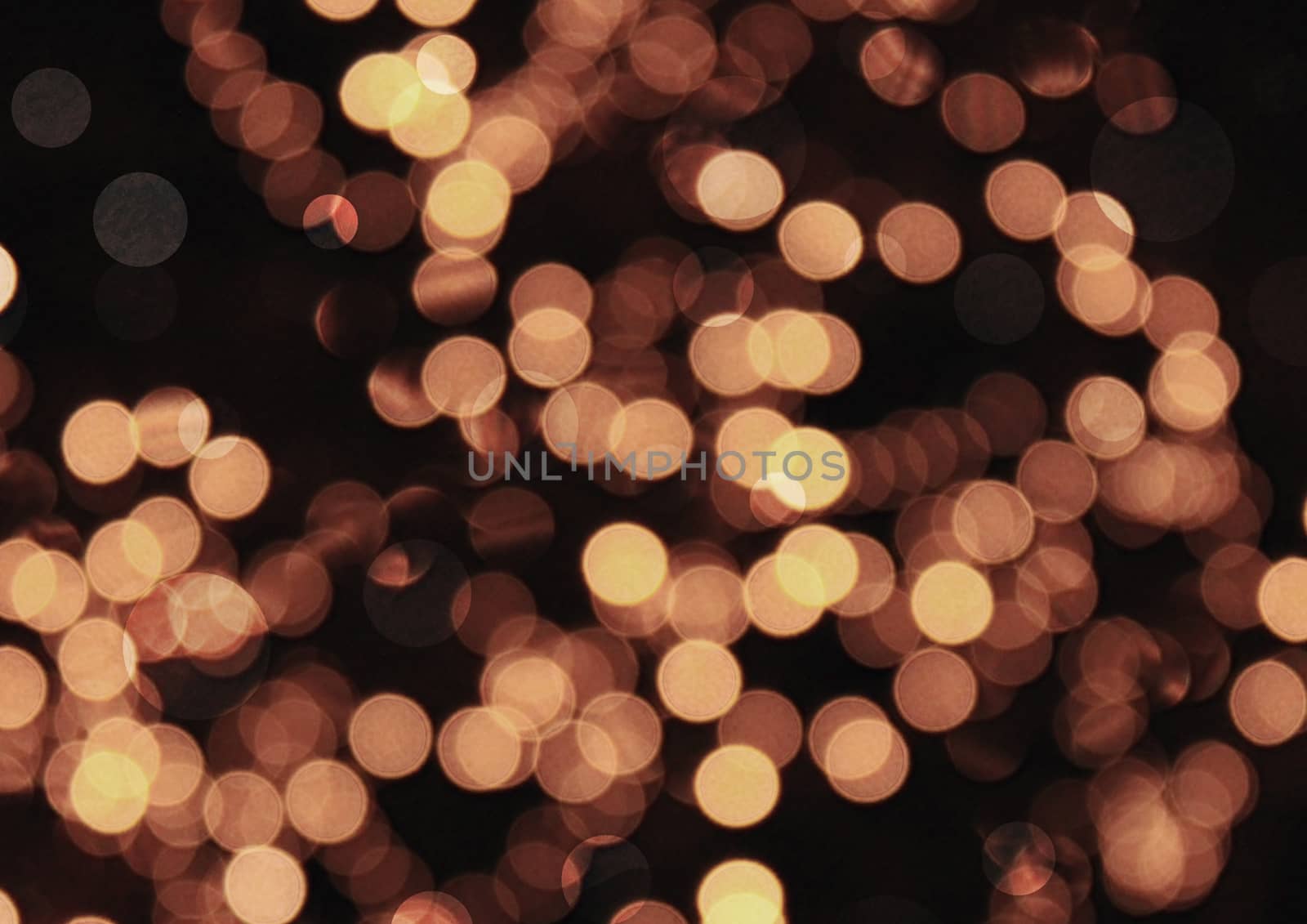 Golden bokeh glittering bright abstract background by cougarsan
