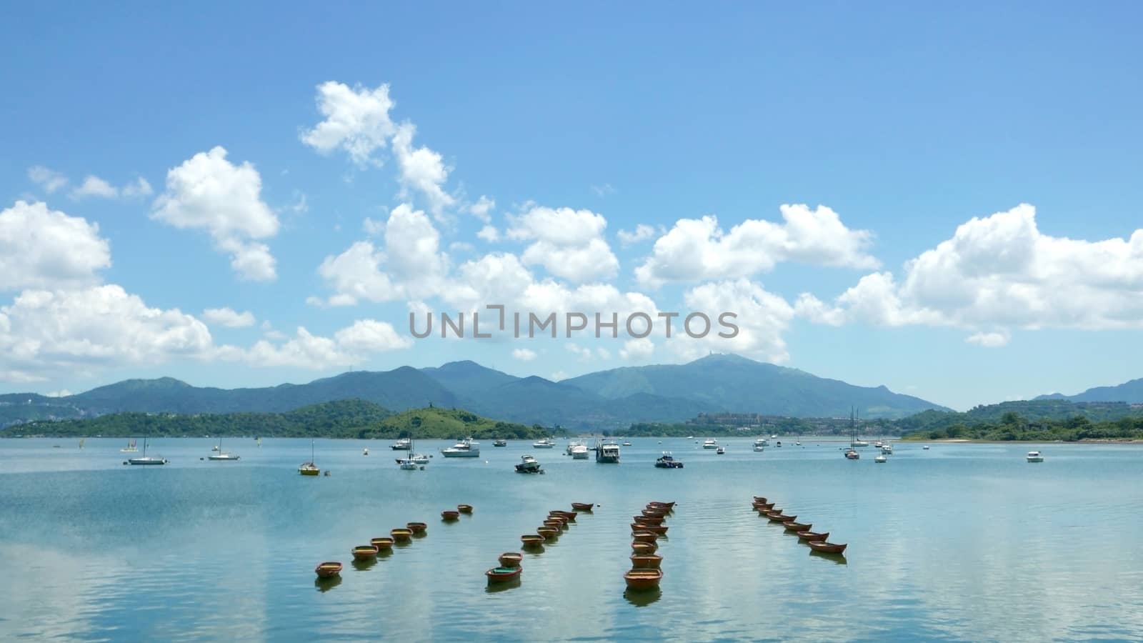 Recreational Boat, lake, white cloud and the blue sky