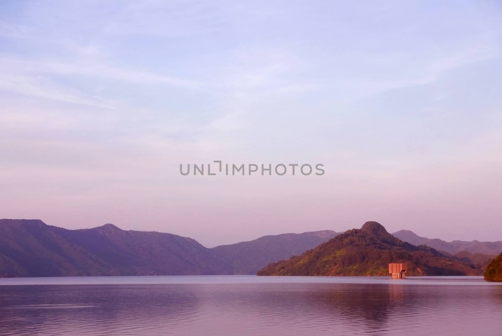 Reservoir, sky, and mountain with the reflection