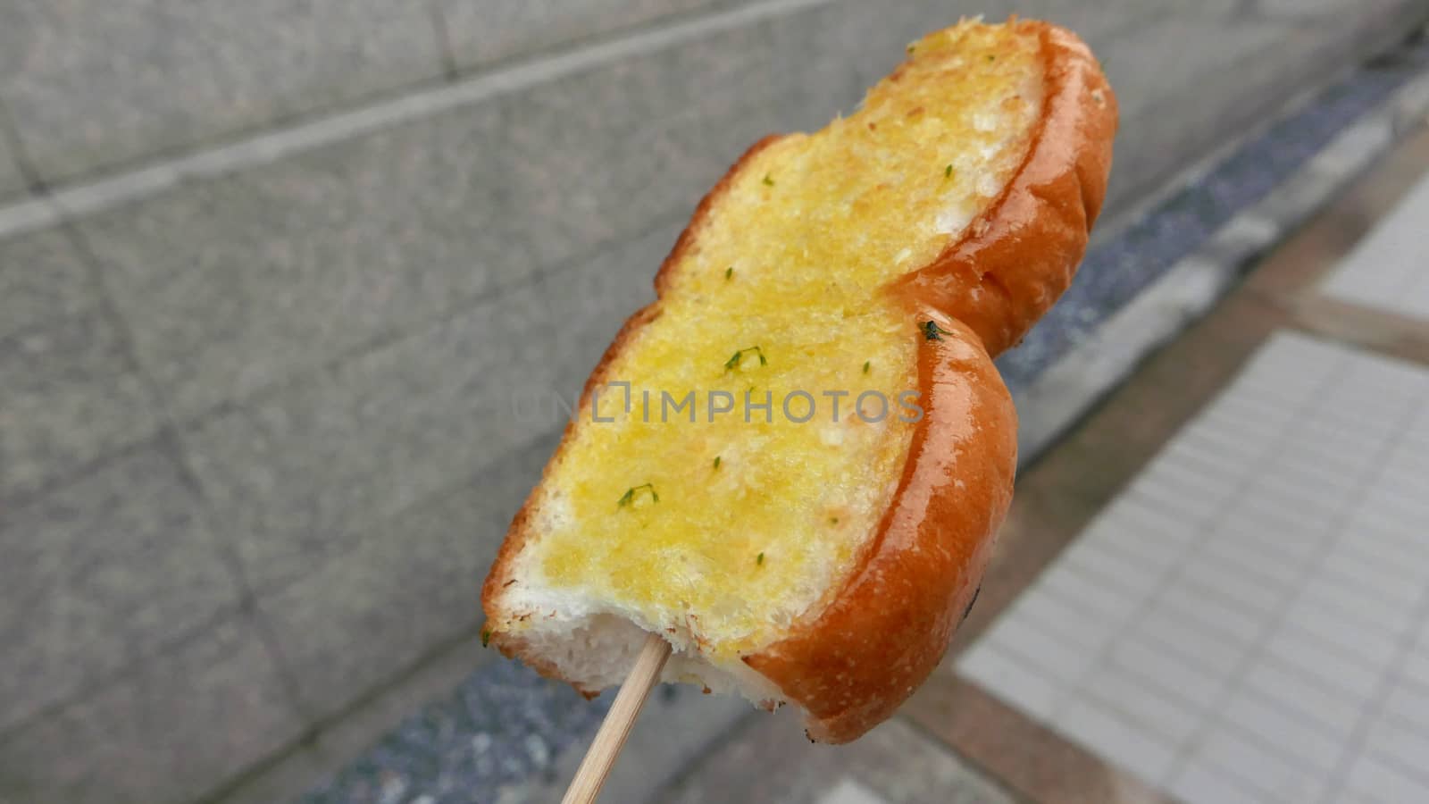 Fresh barbeque outdoor butter garlic bread in Thailand 