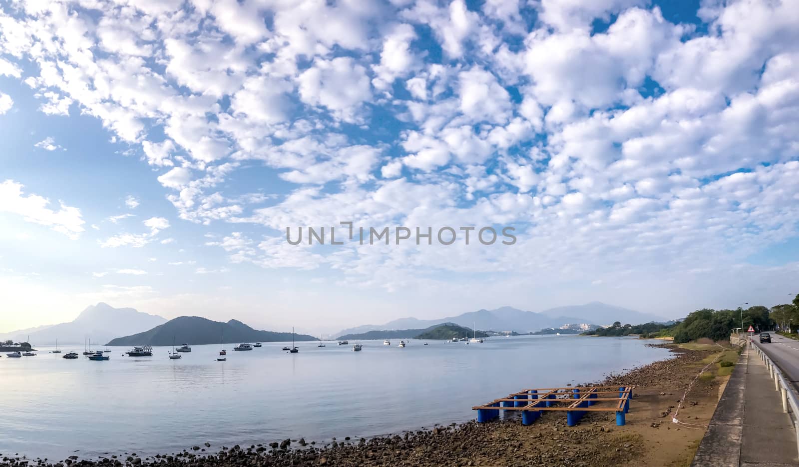 landscape photography - boat, lake, road with dramatric cloud