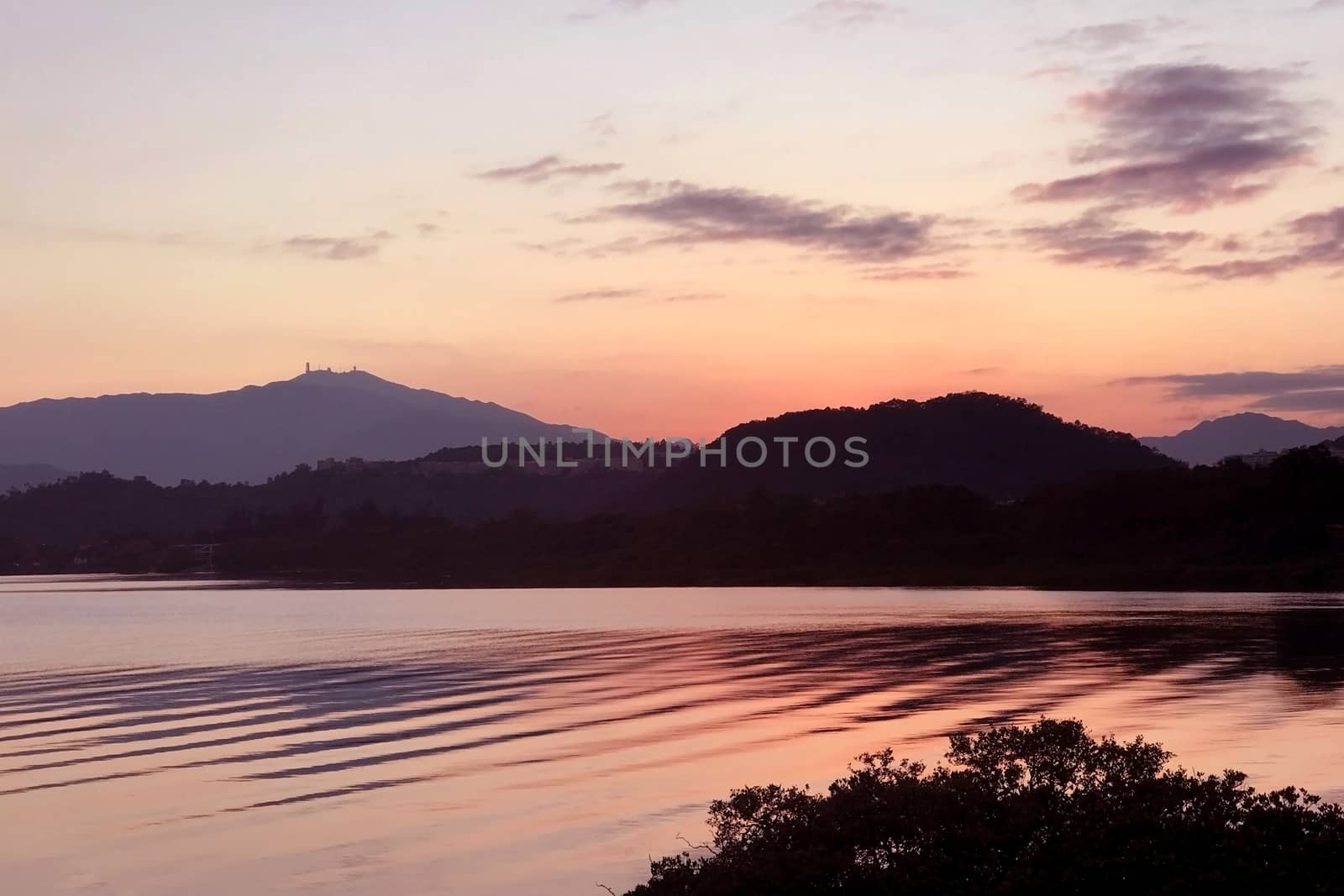 water pond with wave and cloud at sunset by cougarsan