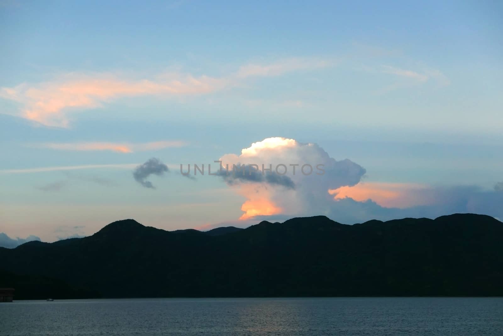 mountain, sea and cloudscape in blue sky by cougarsan