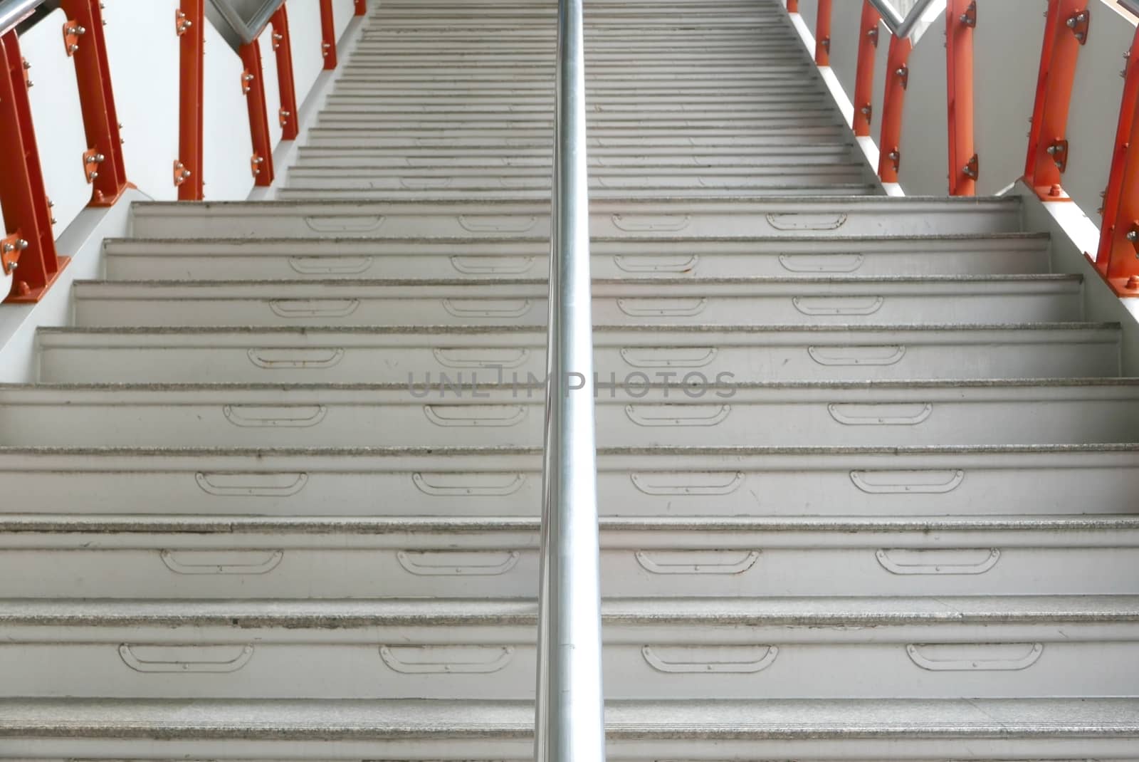 Horizontal up and down staircase in station building  by cougarsan