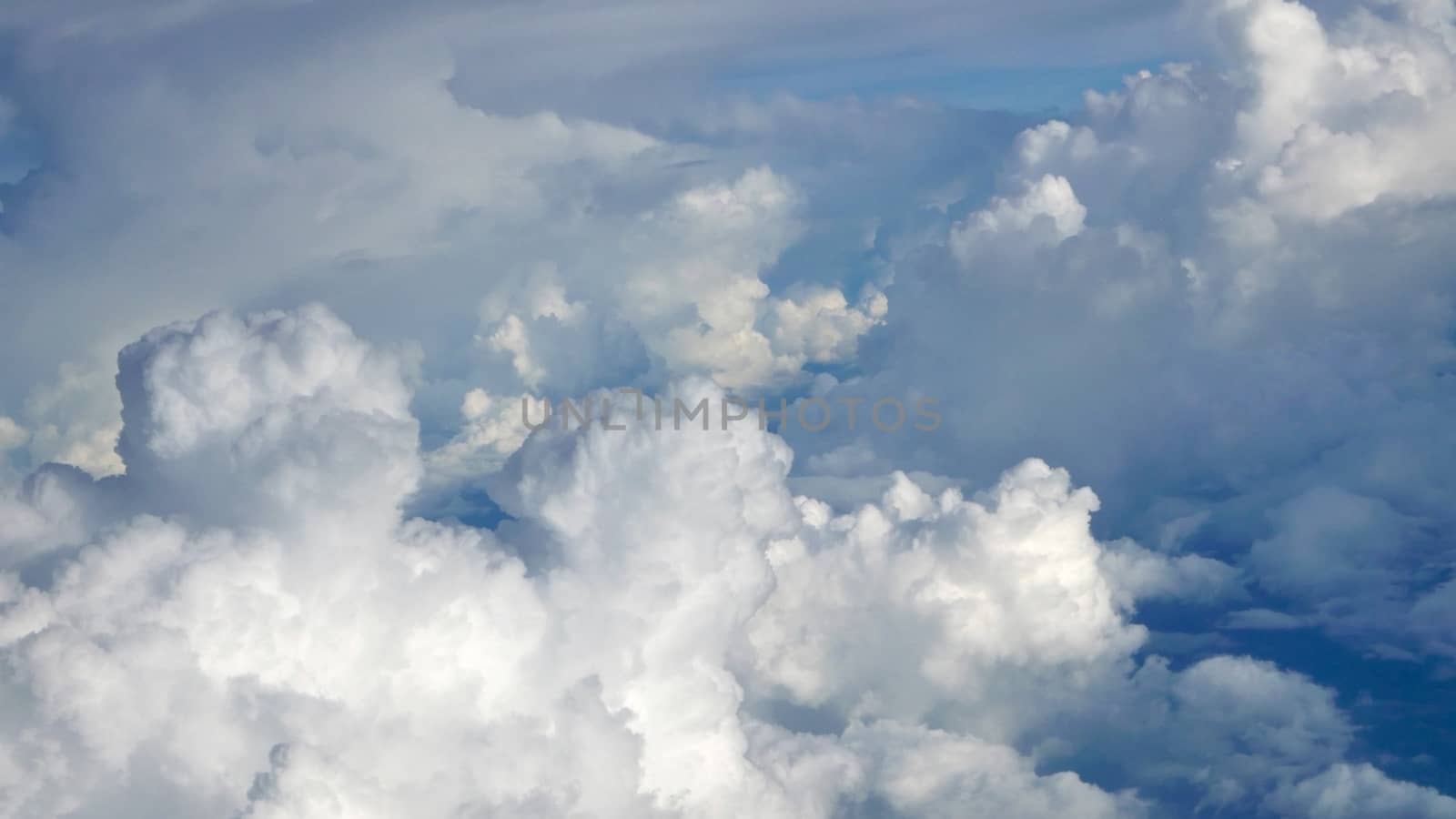 Blue sky cloudscape background from aerial view by cougarsan