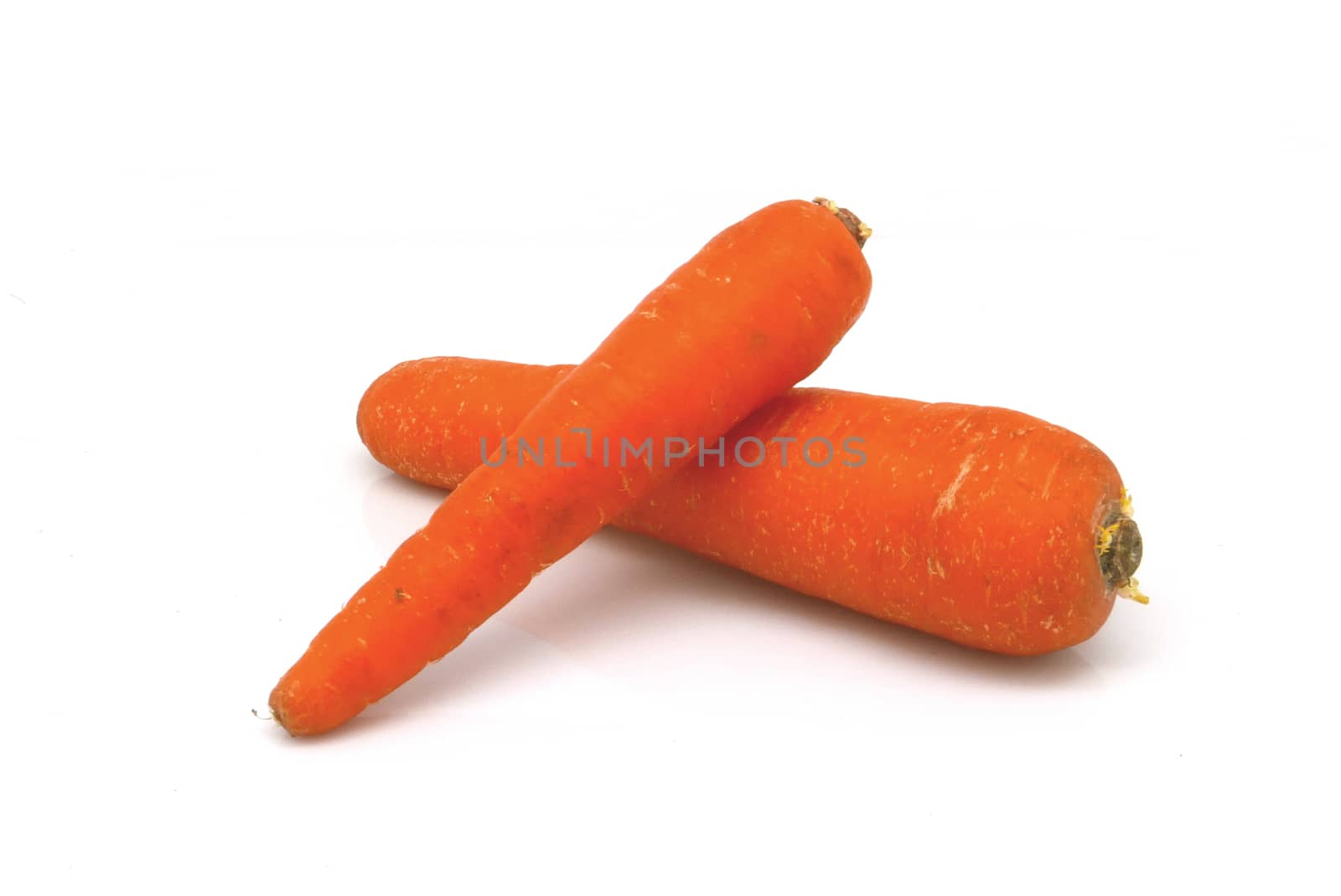 Two carrots isolated on white background