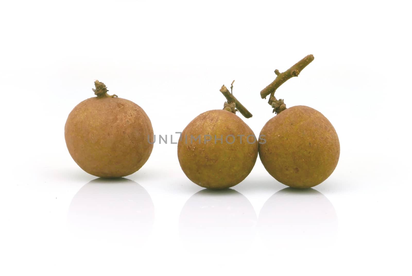 three longans fruit on white background