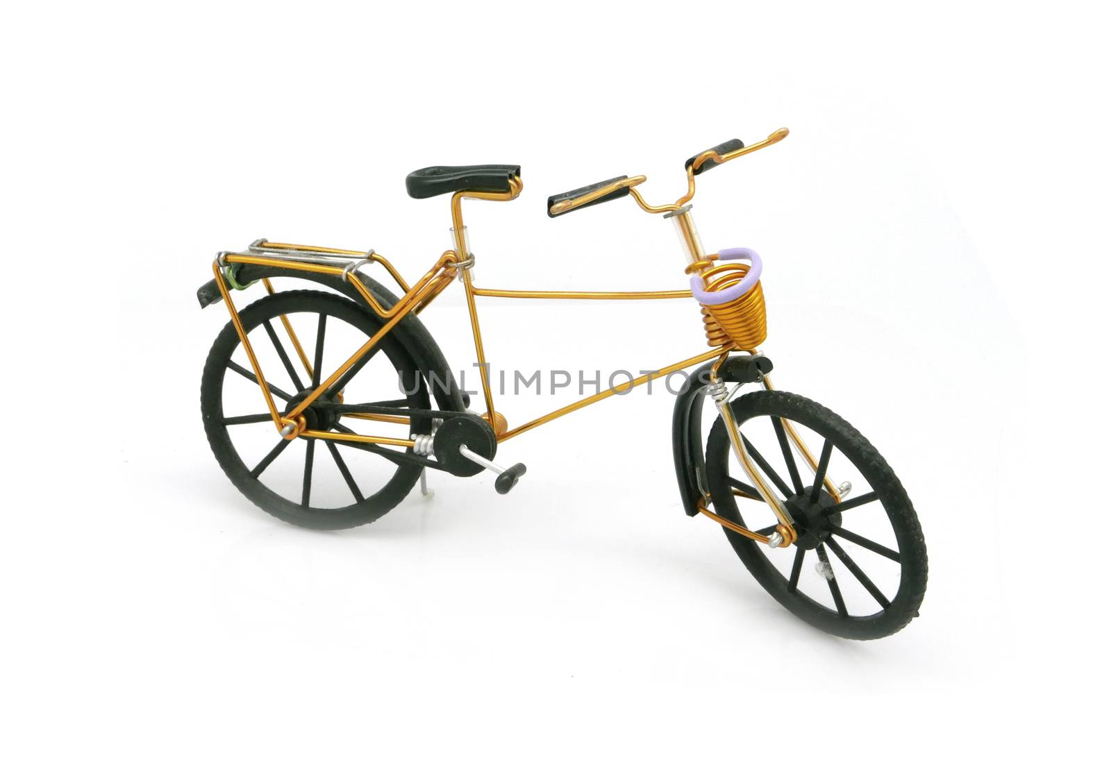 vintage gold bicycle model for decoration on white background by cougarsan