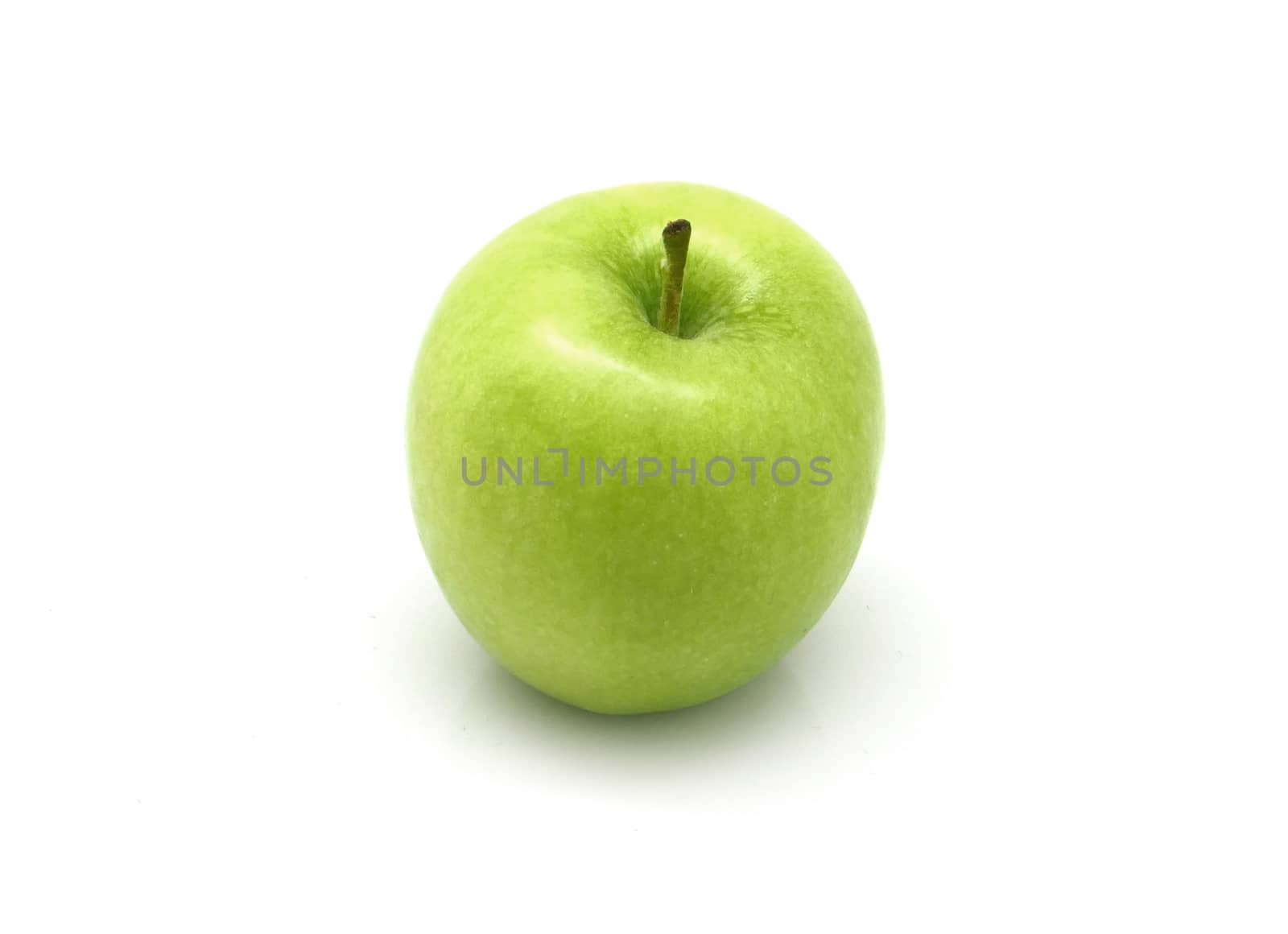 One green apple on white background