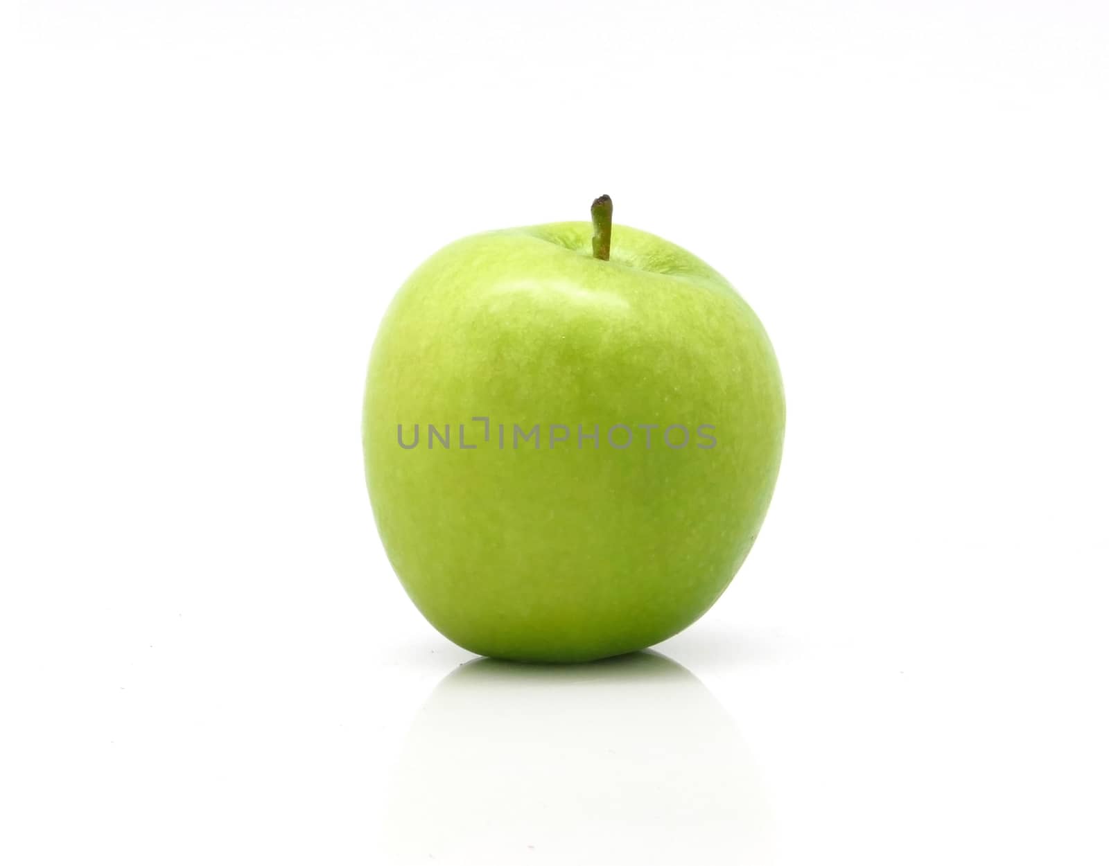 One green apple on white background