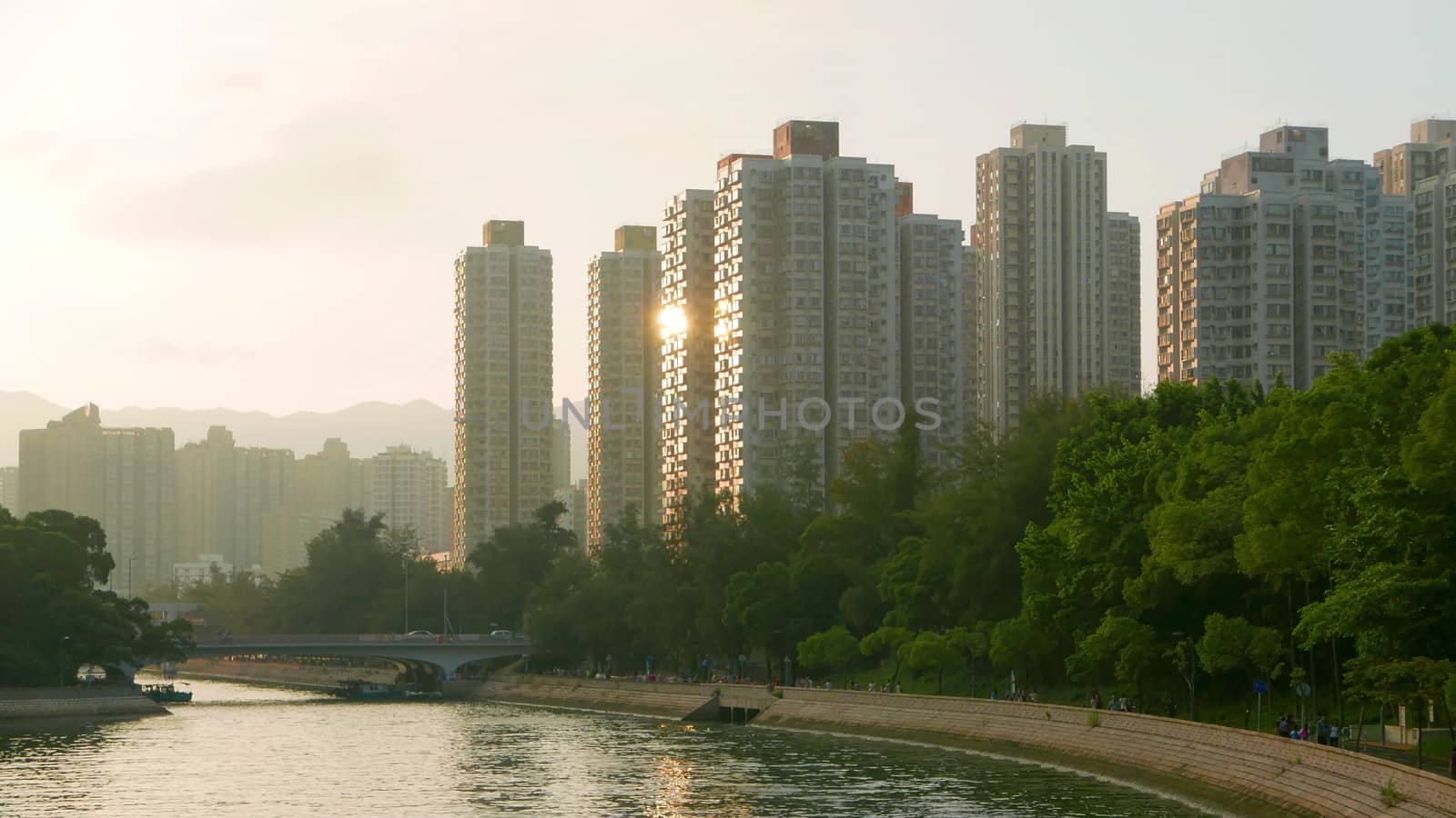 Residential buildings cityscape, cloudscape and river