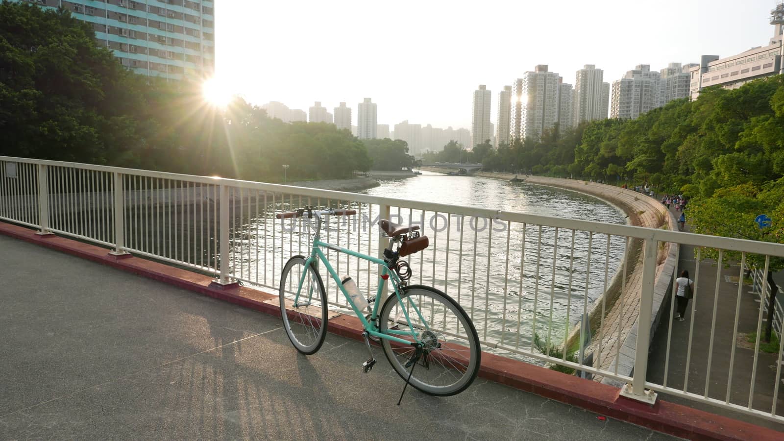 vintage bicycle in Hong Kong residential district at sunset by cougarsan