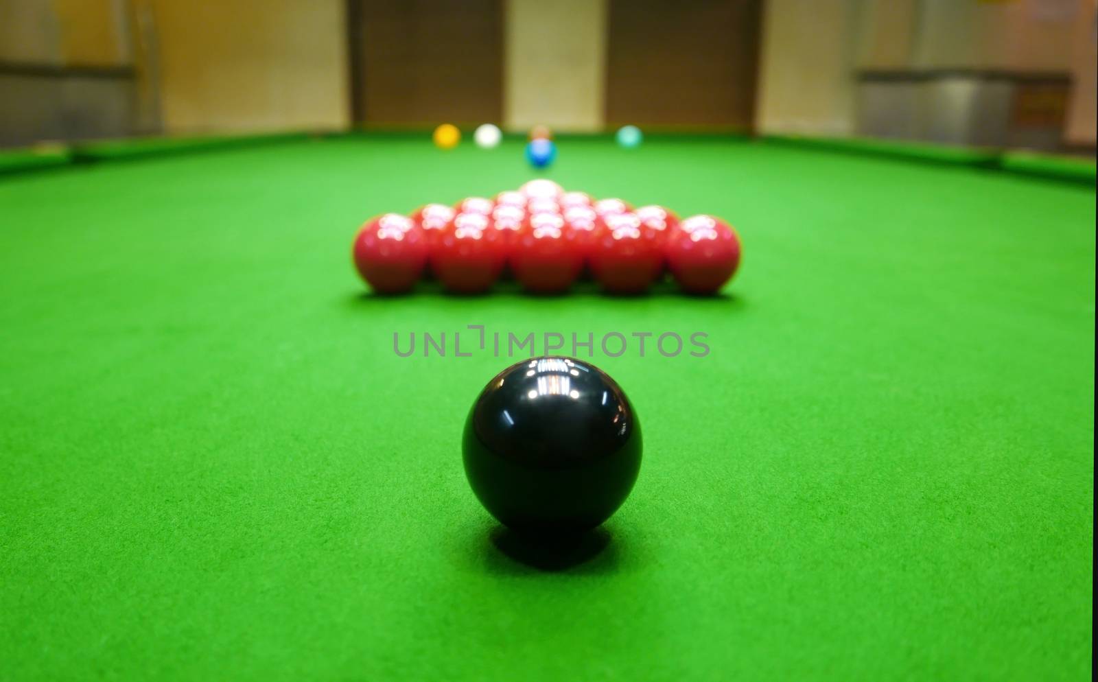 snooker balls and table in private room by cougarsan