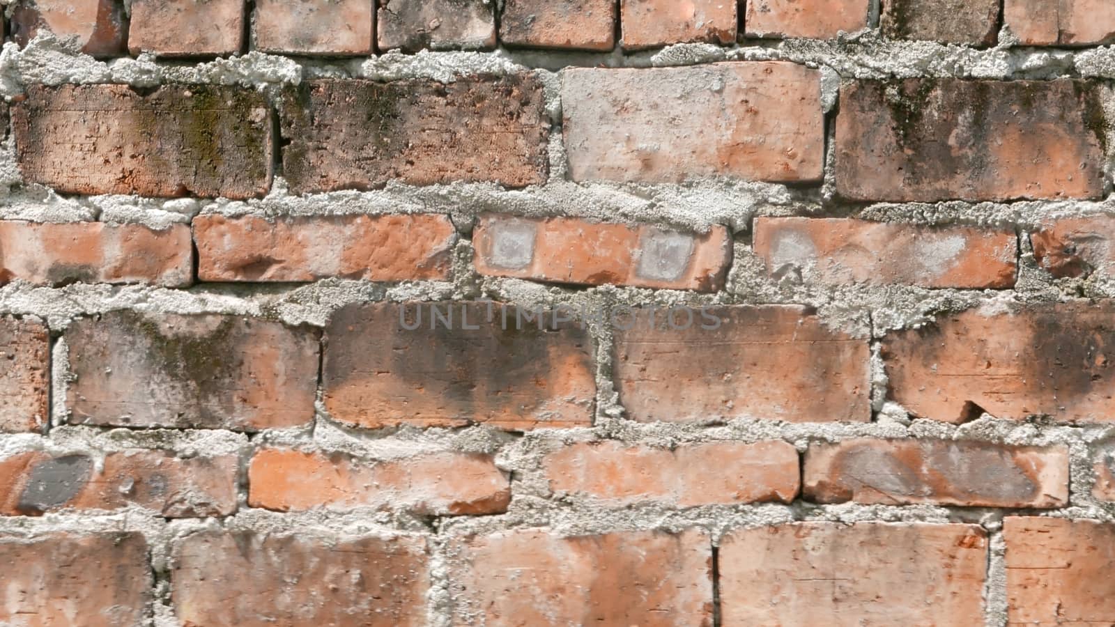 Brick wall background of exterior building by cougarsan