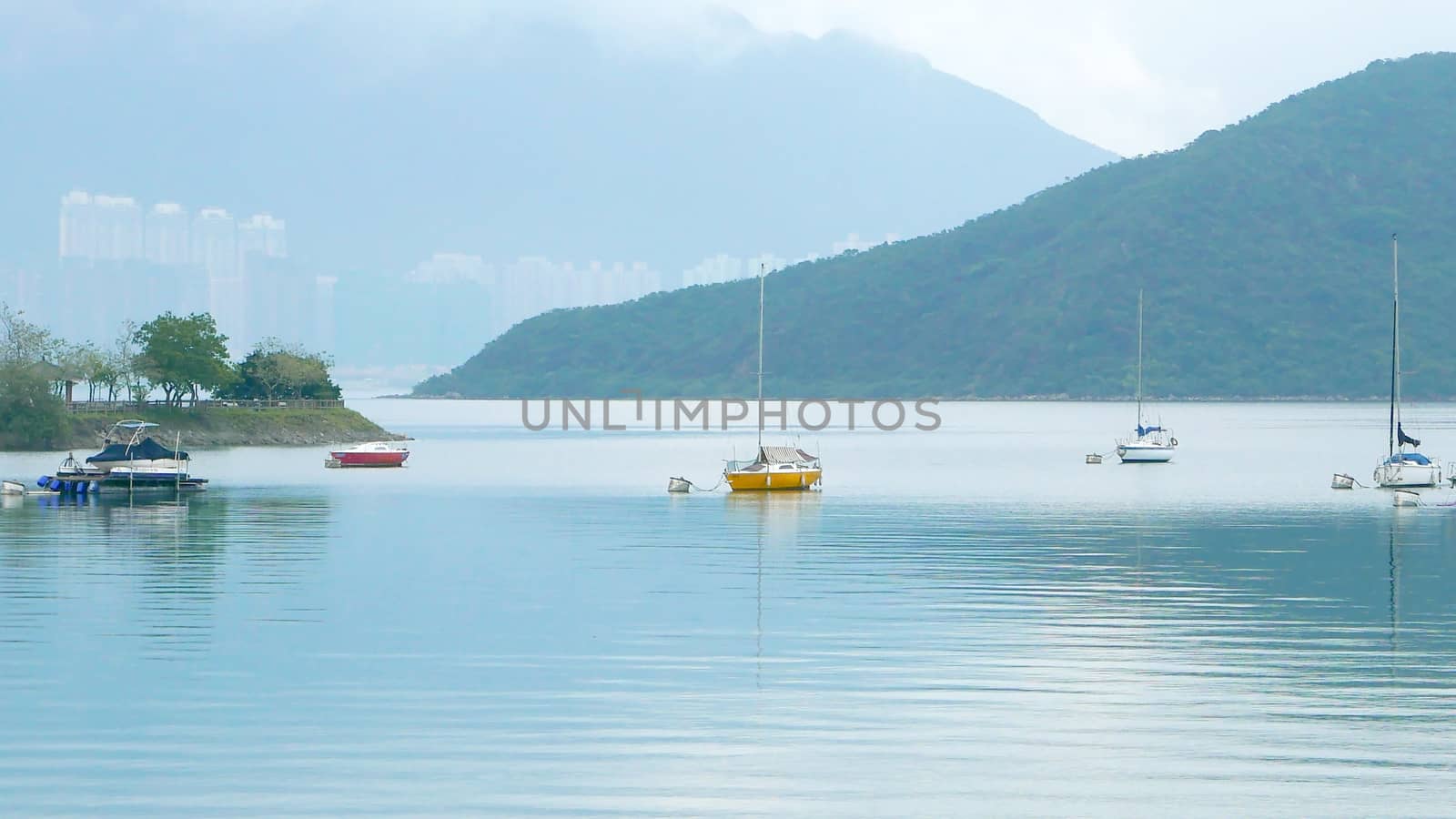 Boats, beautiful clouds, lake and blue sky by cougarsan