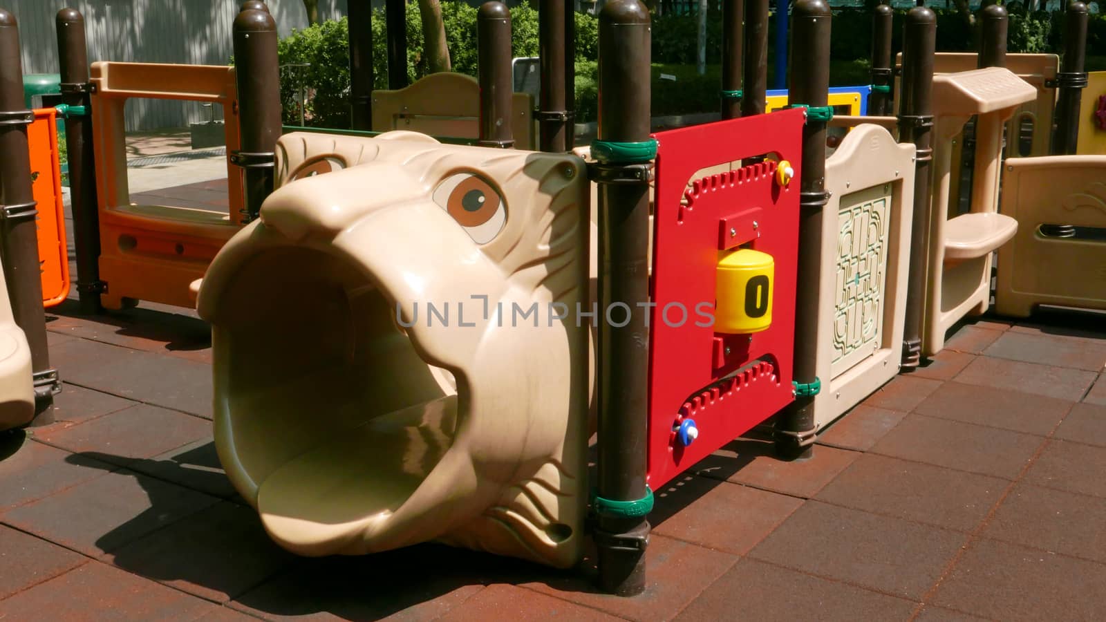 Children plastic castle playground in the park by cougarsan