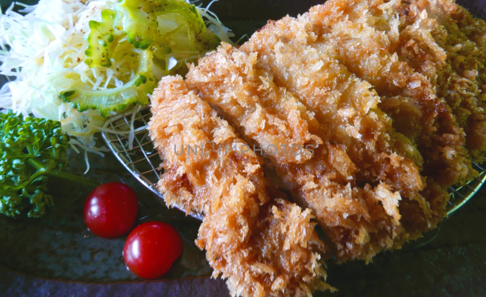 Japanese food Tonkatsu on the plate by cougarsan