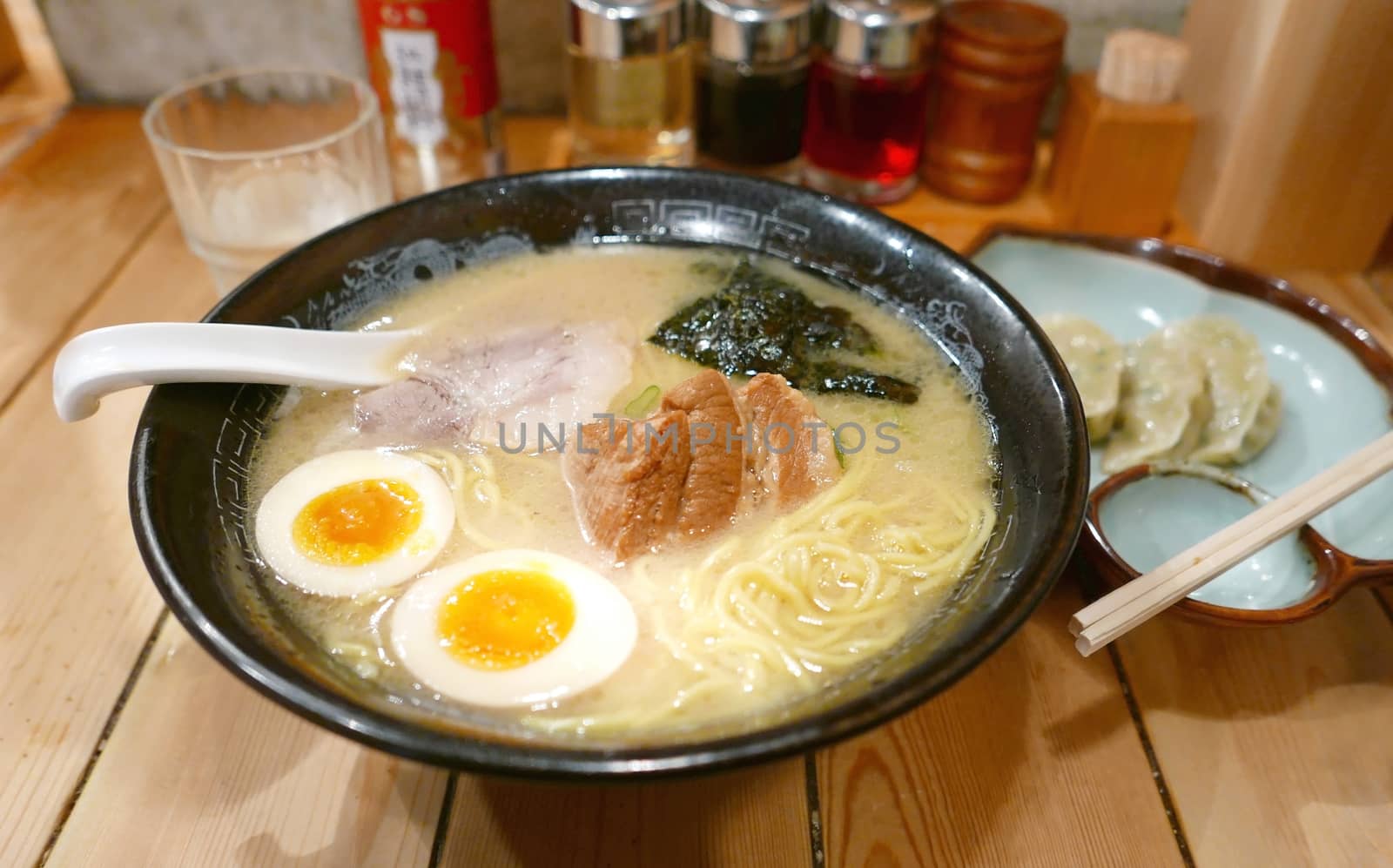 Japanese ramen noodles on the wooden table in Japanese restaurant by cougarsan