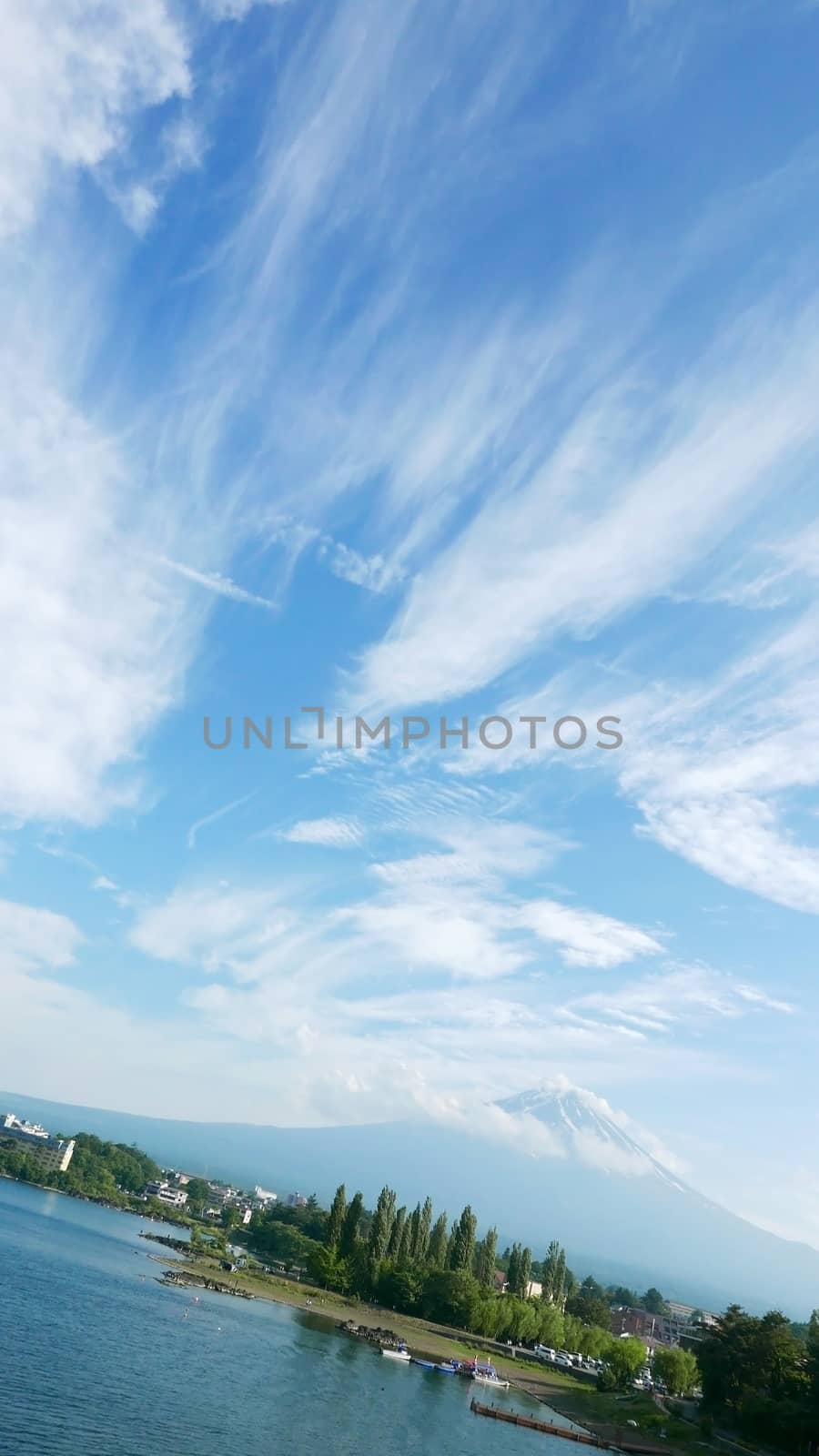 Japan Mt. Fuji Fujiyama Mountain, lake and blue sky with nice clouds