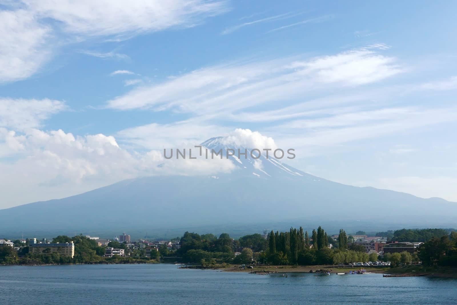 Japan Mt. Fuji Fujiyama Mountain, lake and blue sky with nice clouds by cougarsan