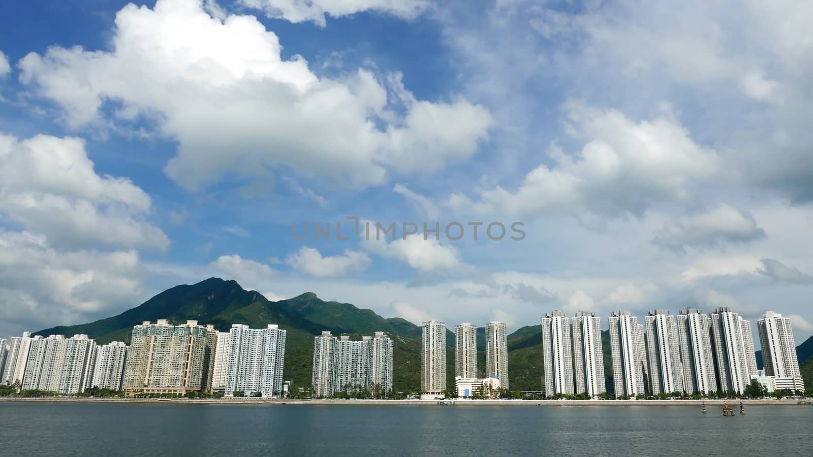 Hong Kong residential buildings cityscape, cloudscape and blue sky