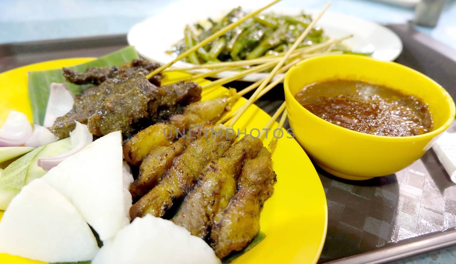 Thailand food, satay with spicy source by cougarsan