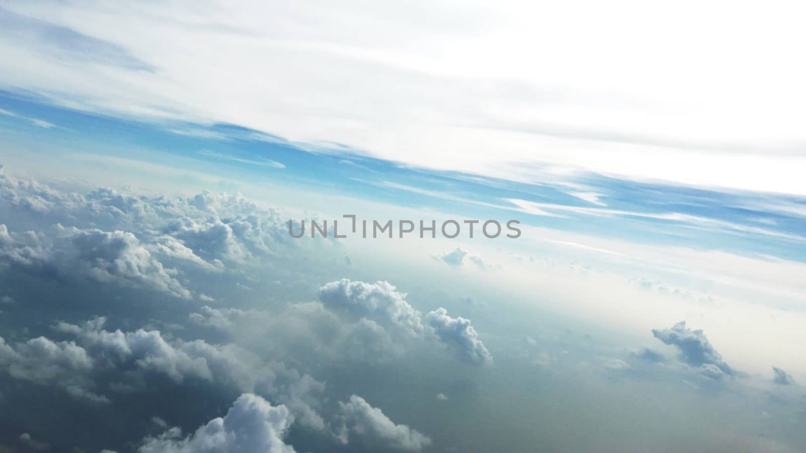 Nice natural clouds in the blue sky from aerial view