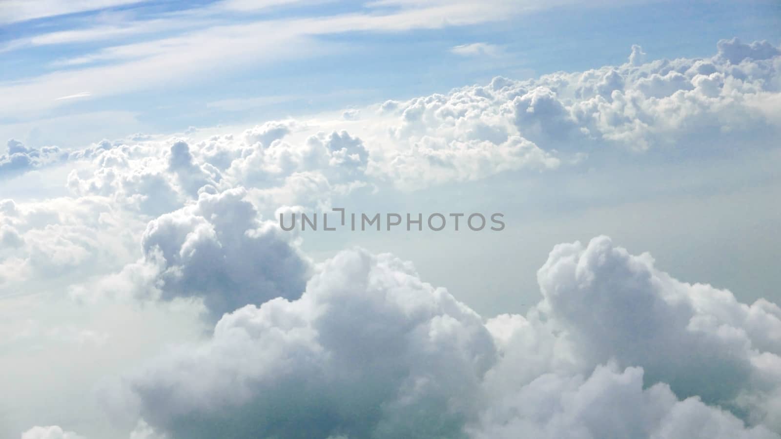 Nice natural clouds in the blue sky from aerial view