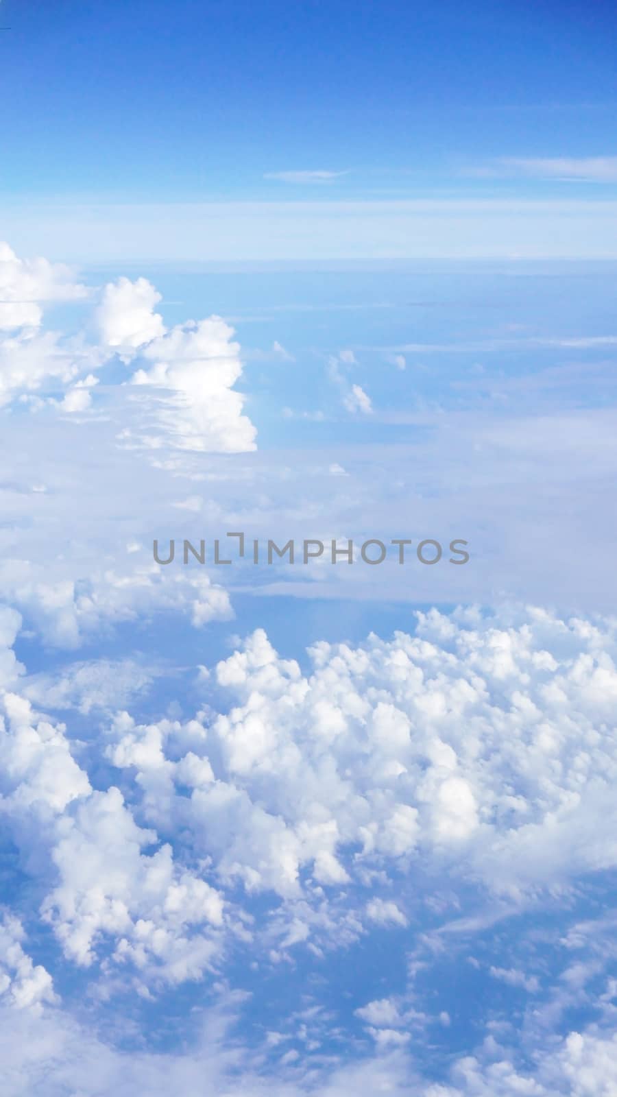 Nice natural clouds in the blue sky from aerial view