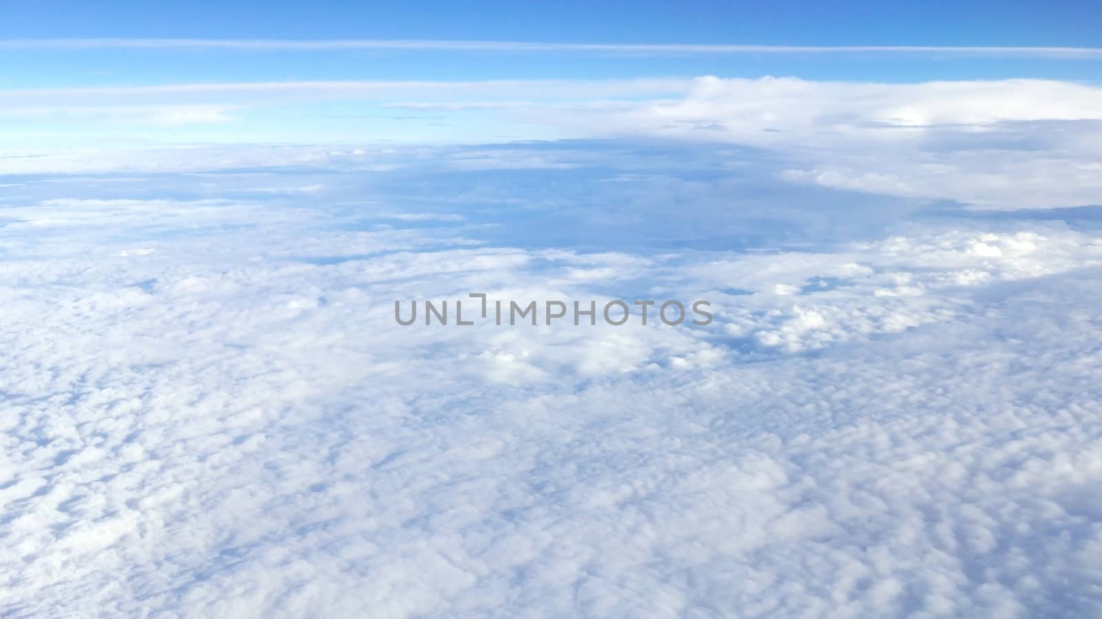 Nice natural clouds in the blue sky from aerial view