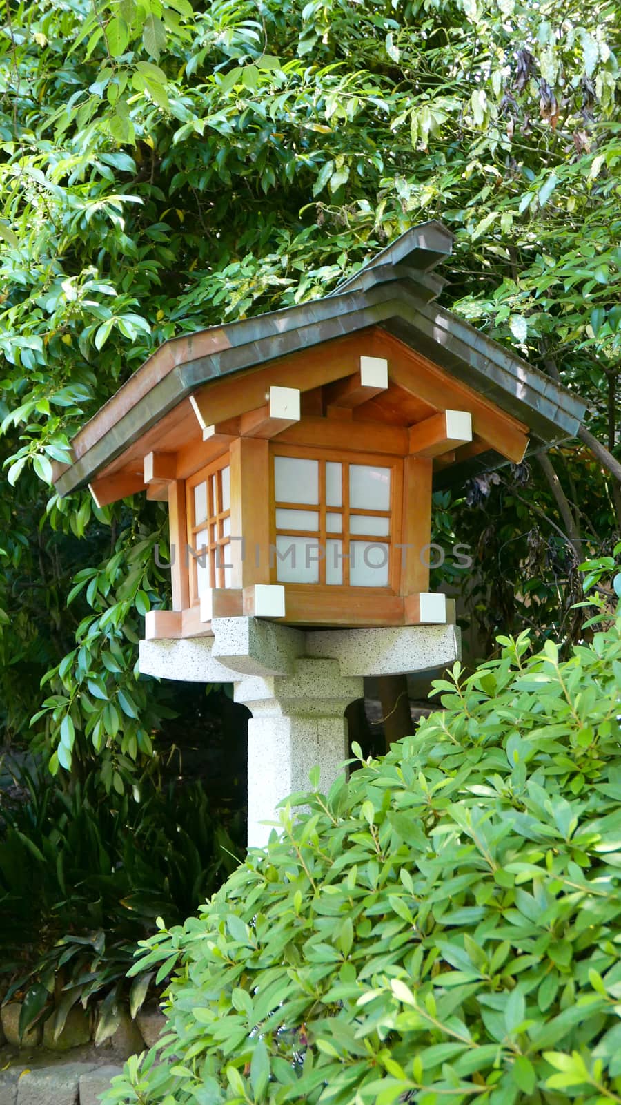 Outdoor traditional wooden lamp in the zen garden