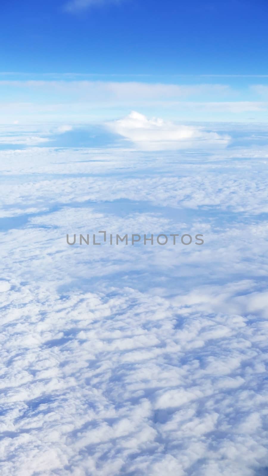 Nice natural clouds in the blue sky from aerial view by cougarsan