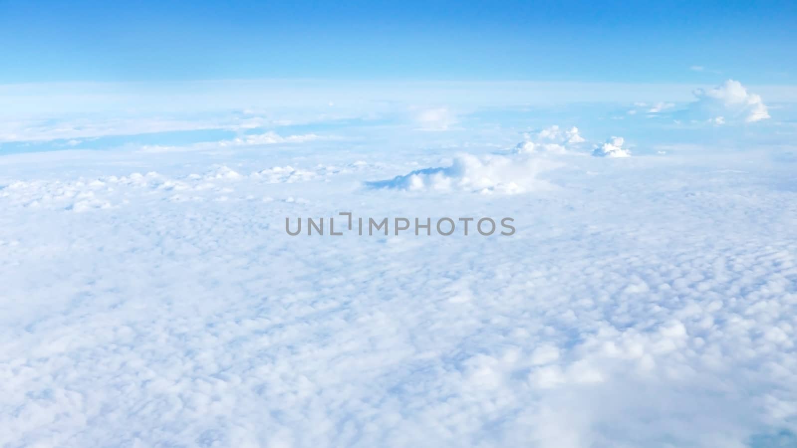 Nice natural clouds in the blue sky from aerial view by cougarsan