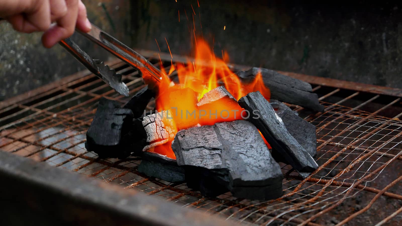Charcoal Coal and fire closeup by cougarsan