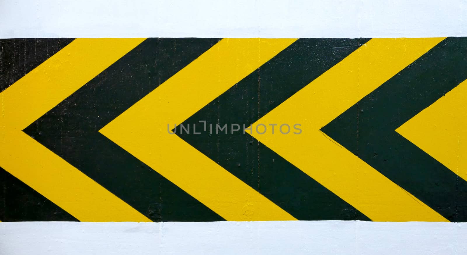 Left yellow and black wall warning road sign