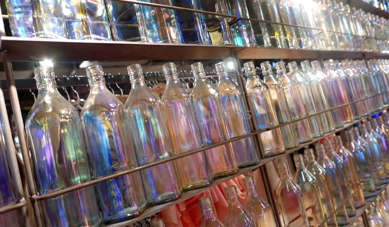 Interior decoration by empty vintage glass bottles
