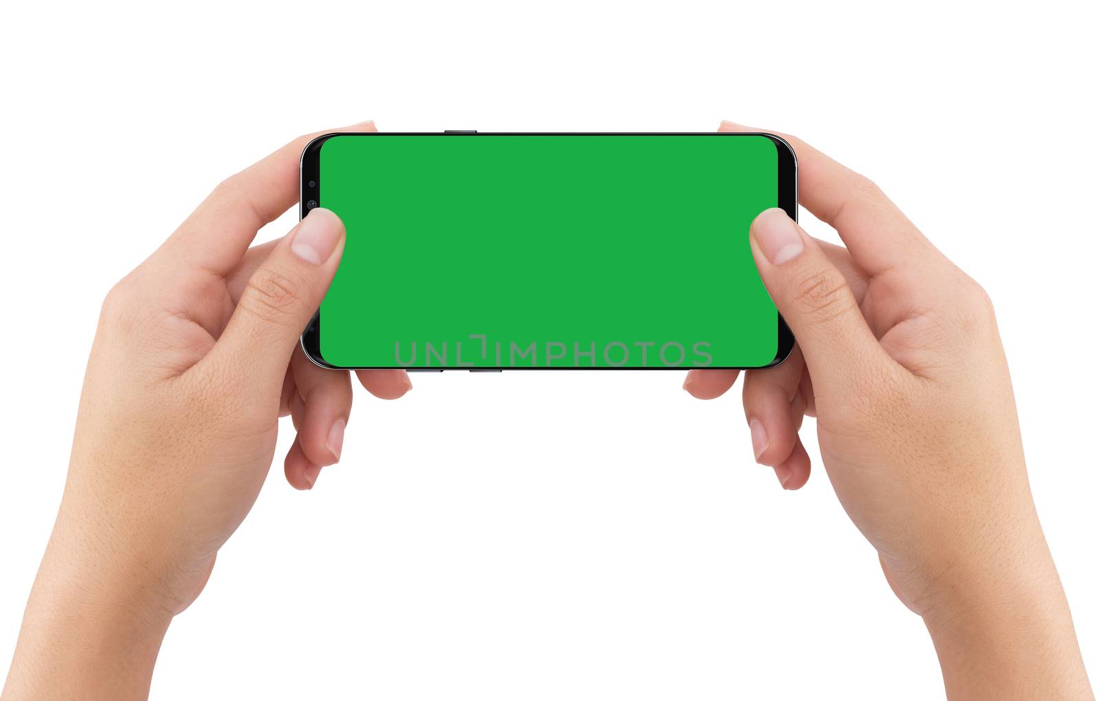 Isolated human two hands holding black mobile smart phone with green screen for video production