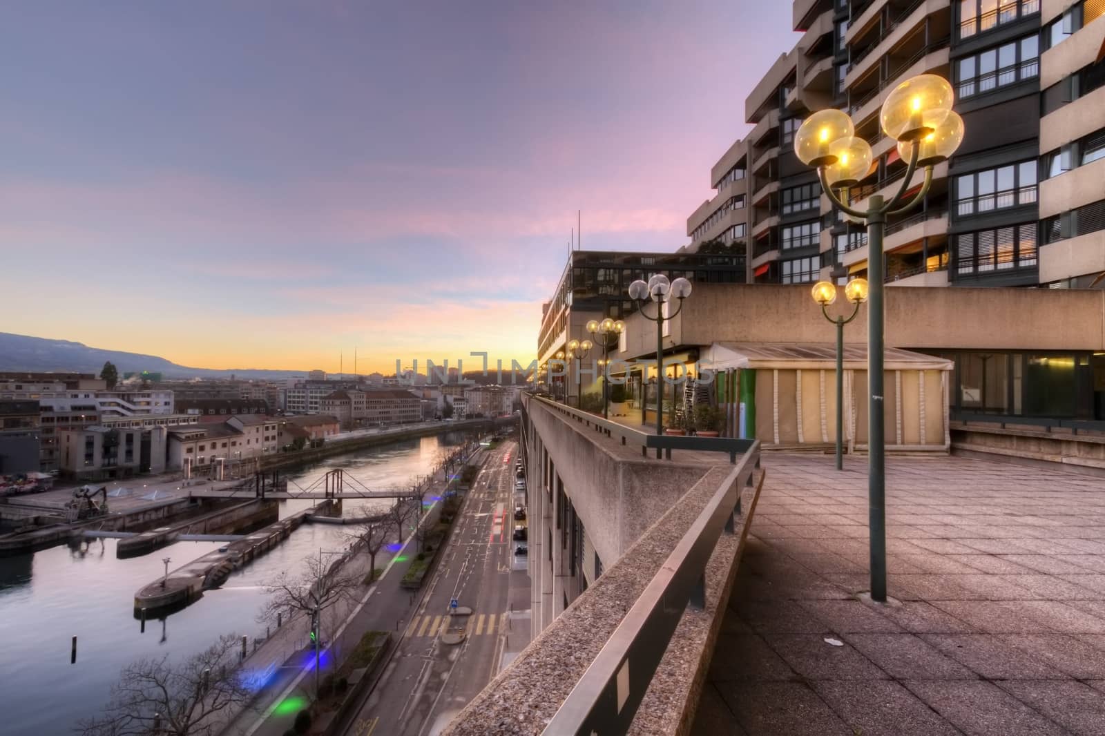 Rhone river and old buildings by sunset, Geneva, Switzerland - HDR