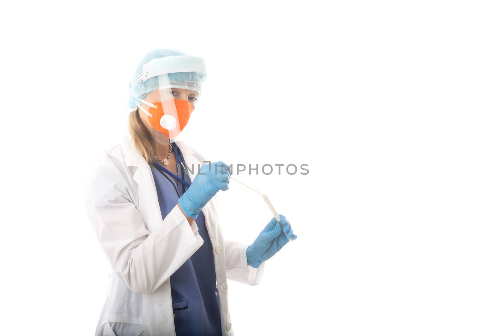 Healthcare worker holding a nose and throat swab by lovleah