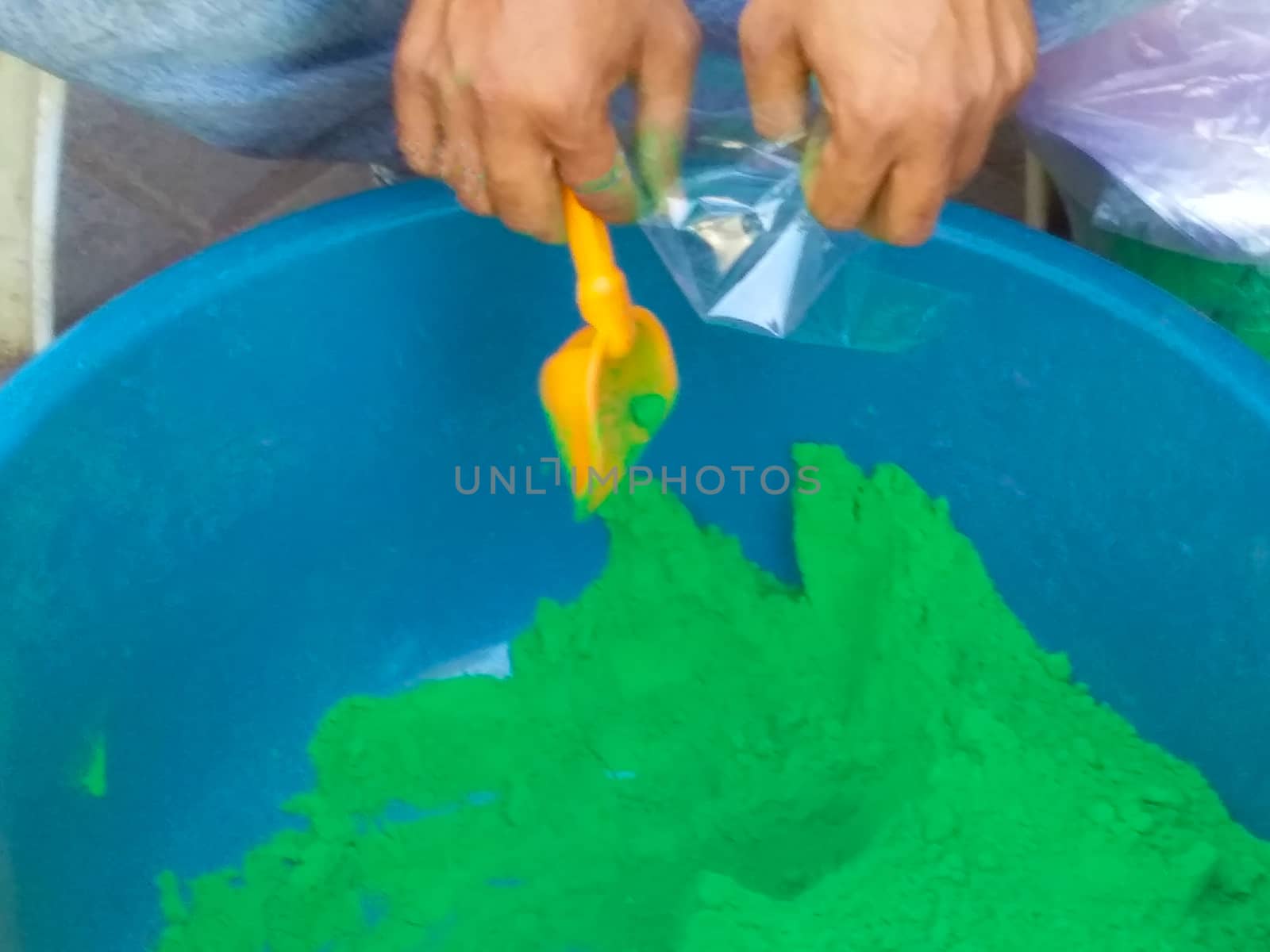mixing colors for holi festival