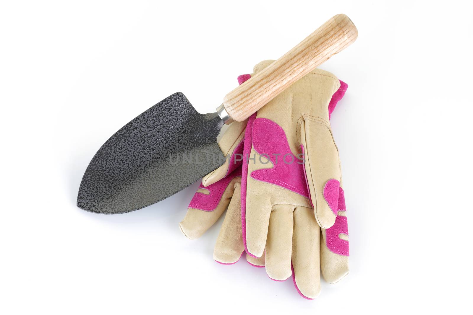 A pair of ladies gloves and trowel for the garden