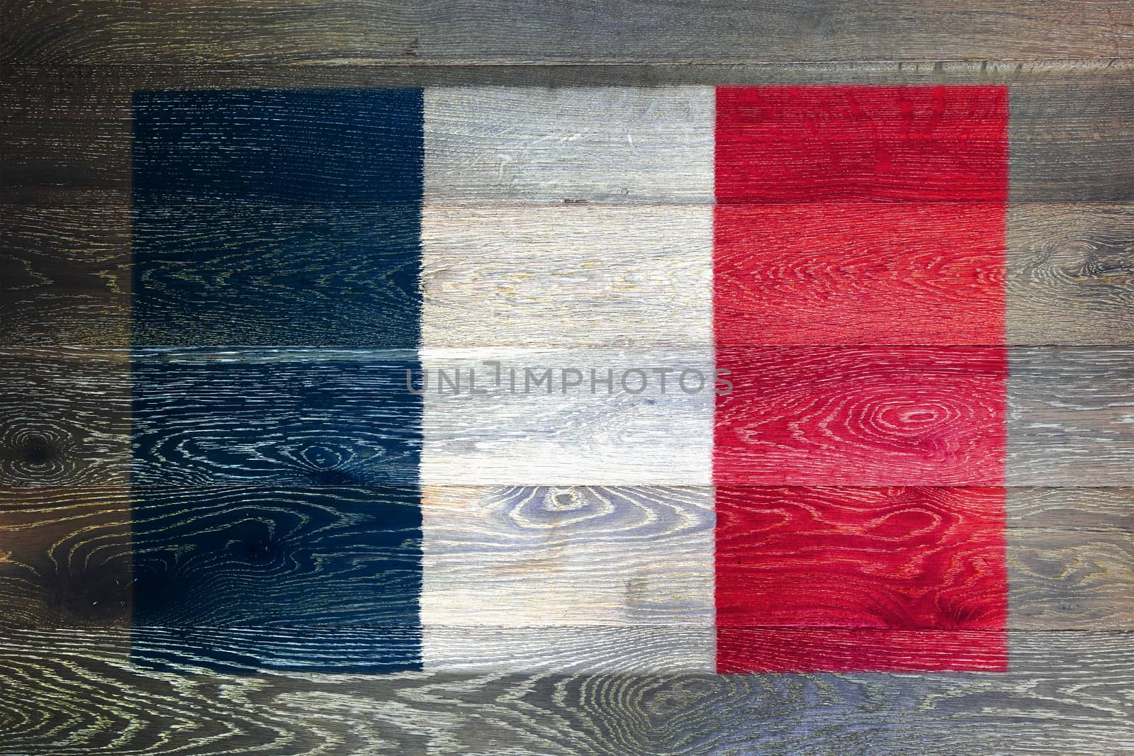 France flag on rustic old wood surface background by VivacityImages