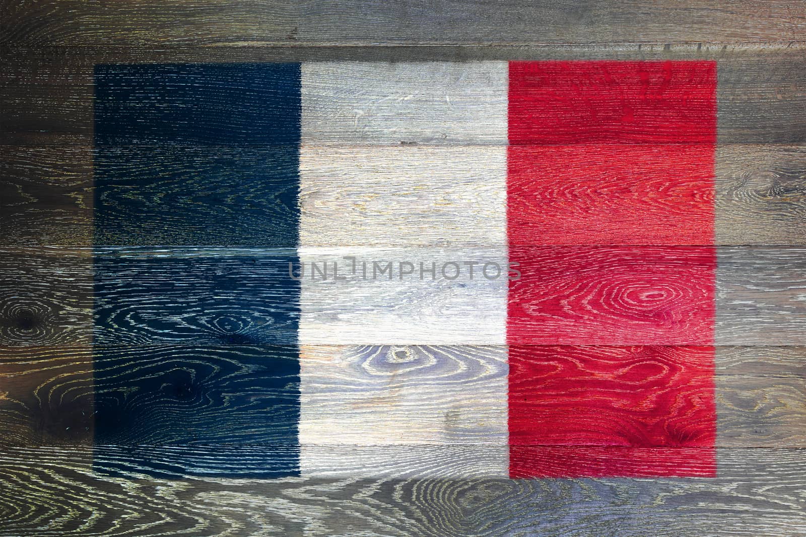 A France flag on rustic old wood surface background