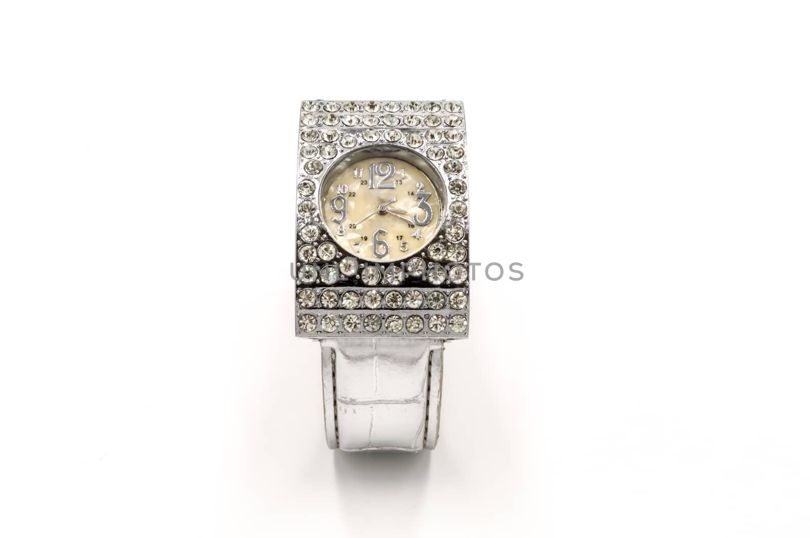 Silver quartz watch with precious stones on a white background