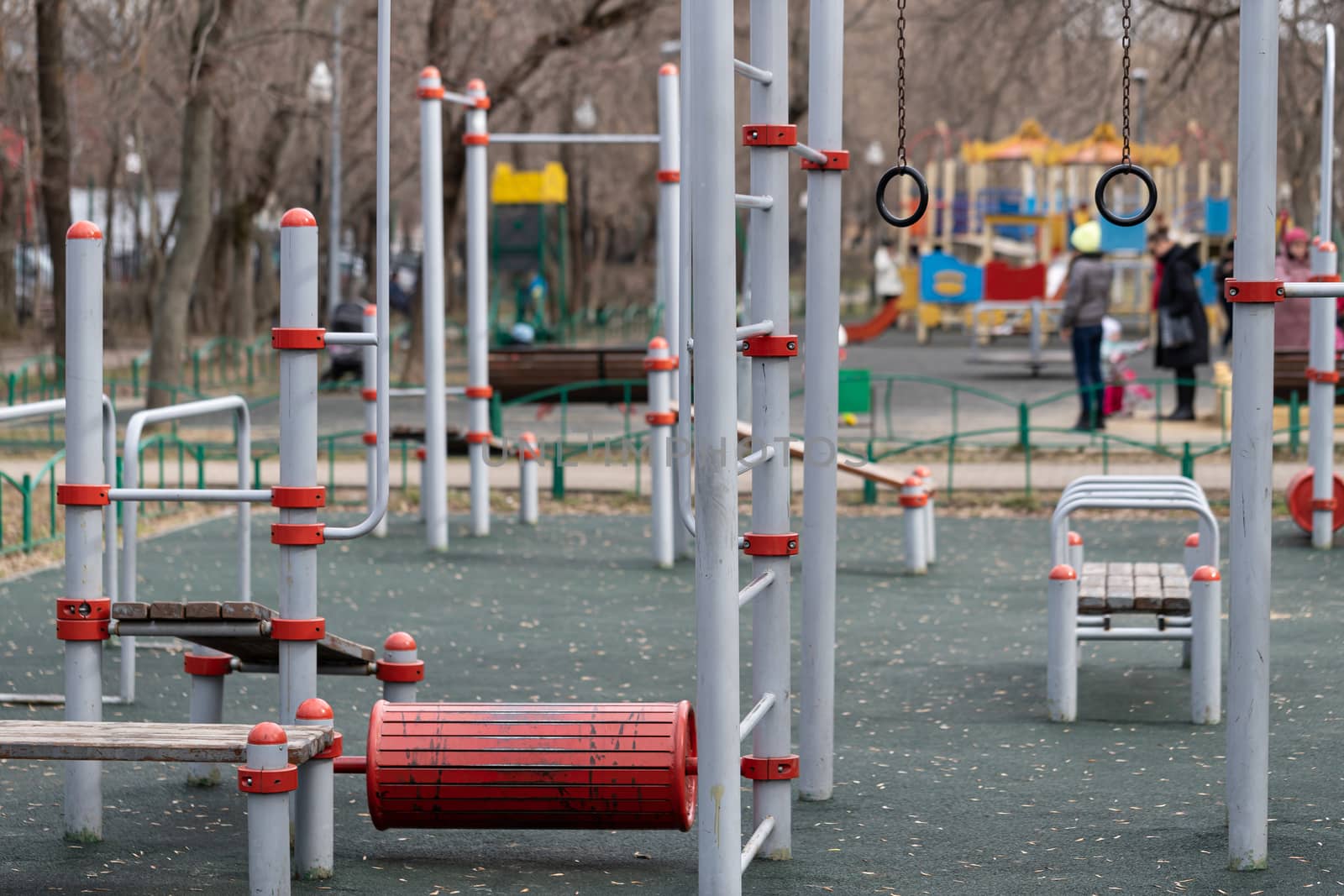 Empty children's playground with no children by bonilook