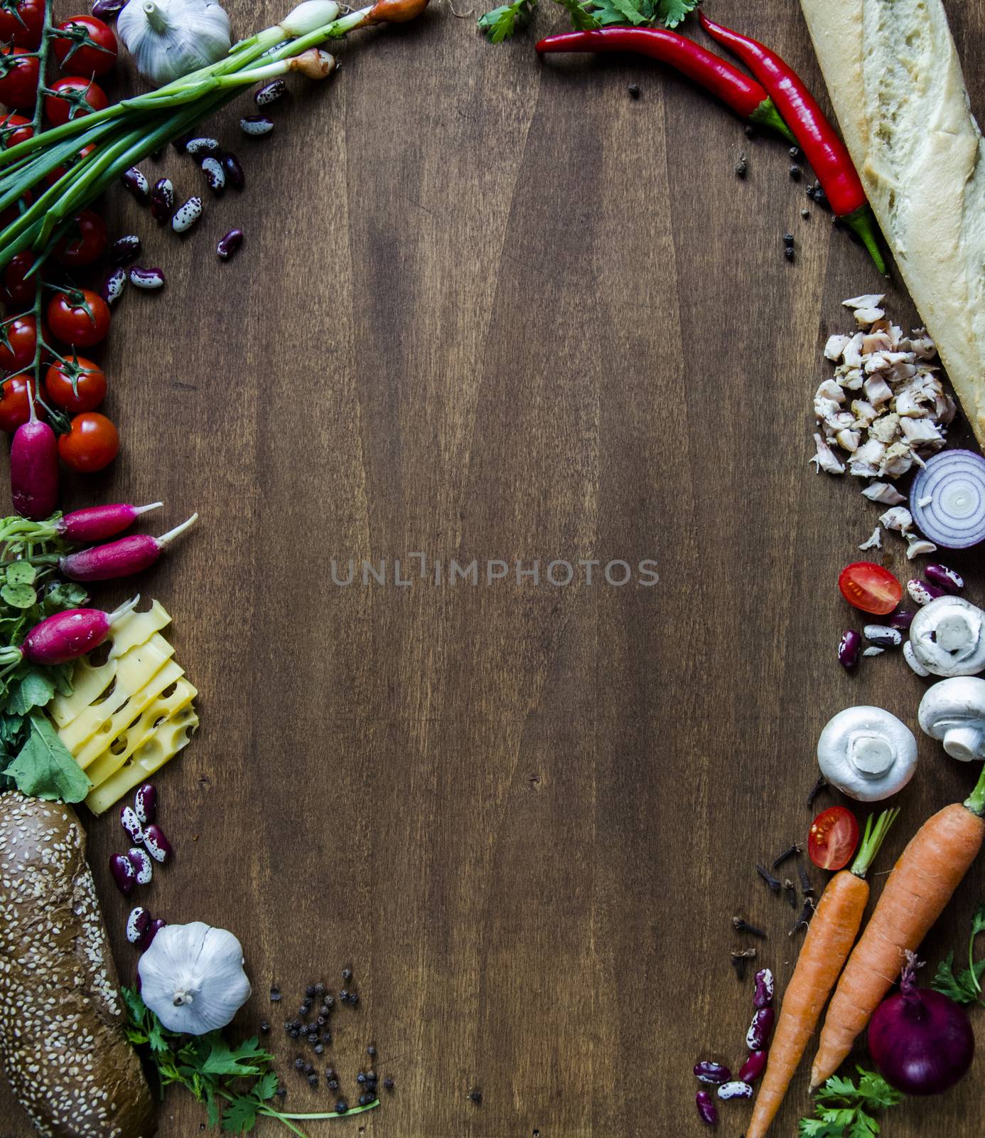Vegetables, cheese, bread on wood. Bio Healthy food, herbs and spices. Organic vegetables on wood. Mock up with vegetables