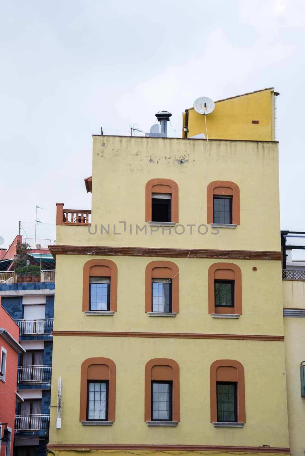 Beautifull yellow house in Lloret De Mar with Decorative orange windows, Costa Brava, Catalonia, Spain