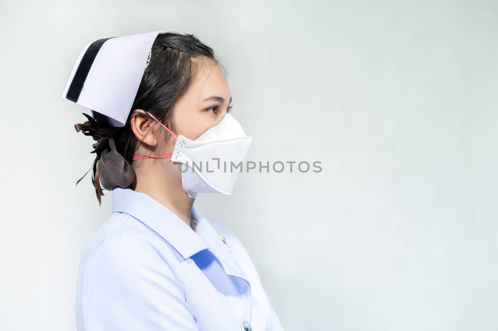 Nurses wear masks to protect against coronavirus covid19 by sarayut_thaneerat