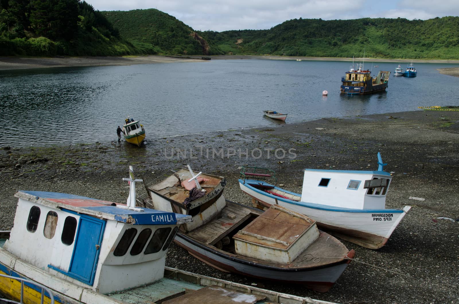 Puerto Montt. Los Lagos Region. Chile. January 26, 2012: fishing boats stranded in the Angelmo district.